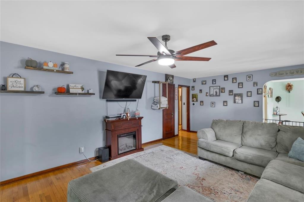 634 Rose Street Apollo, PA 15613 - Photo 7 of 29 a living room with furniture and a flat screen tv