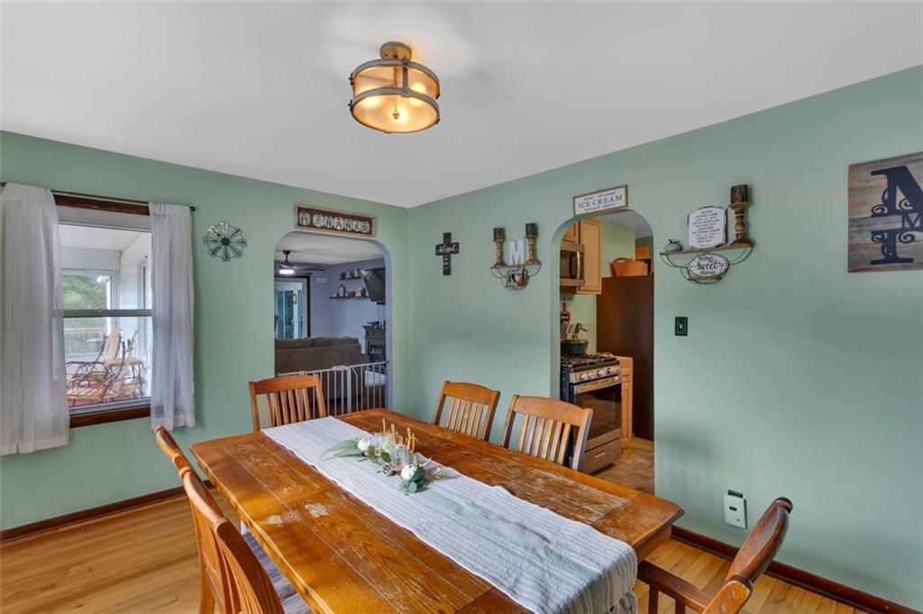 634 Rose Street Apollo, PA 15613 - Photo 9 of 29 a view of a dining room with furniture and wooden floor