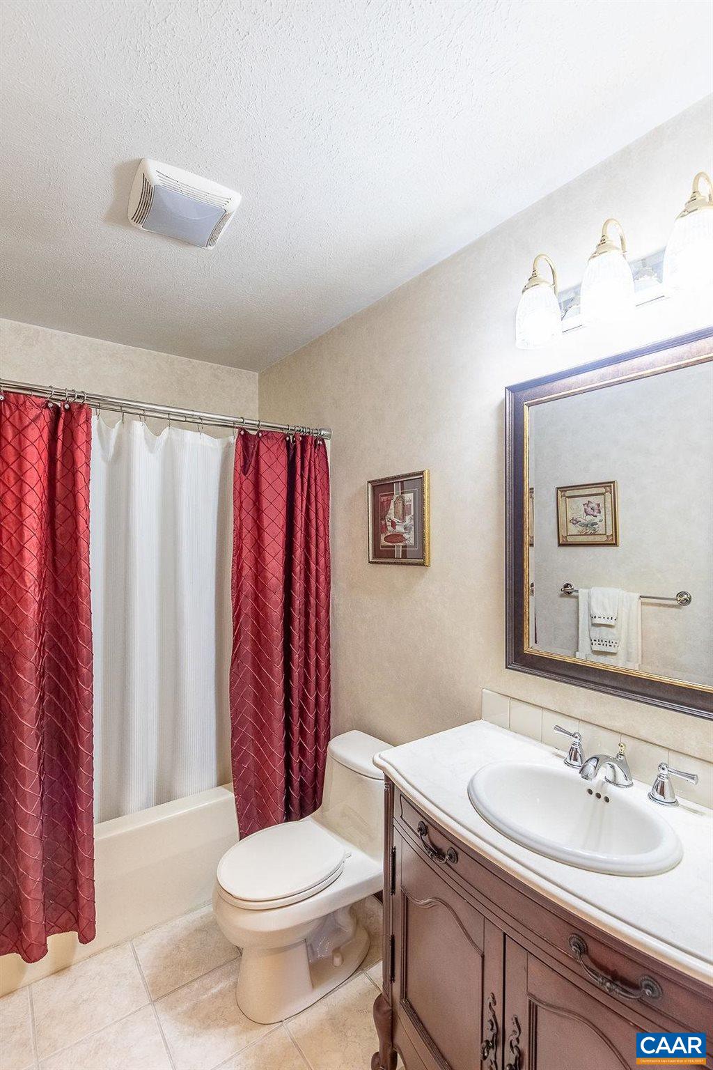 3248 Welsh Run Road Ruckersville, VA 22968 - Photo 18 of 43 a bathroom with a sink toilet and shower