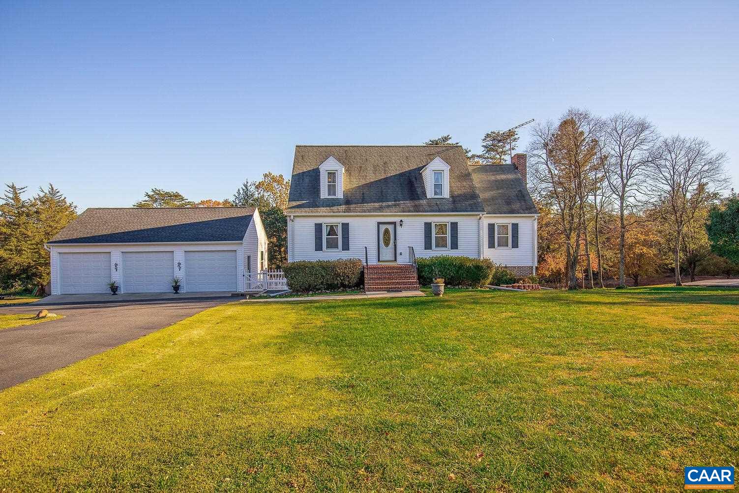 3248 Welsh Run Road Ruckersville, VA 22968 - Photo 2 of 43 a house view with swimming pool in front of it