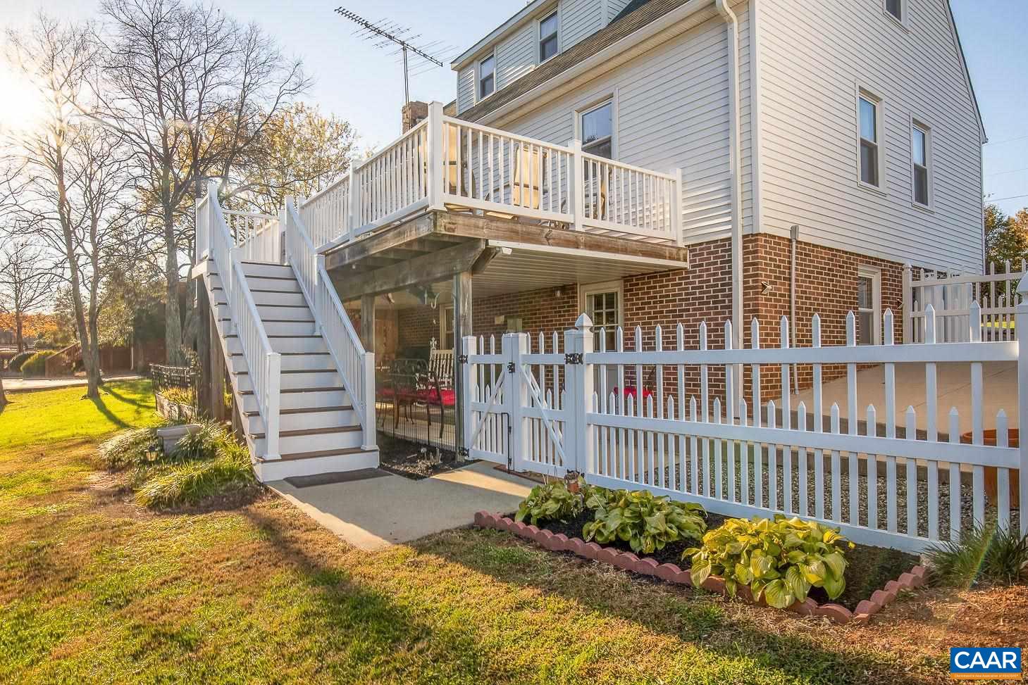 3248 Welsh Run Road Ruckersville, VA 22968 - Photo 34 of 43 a view of a house with a wooden deck