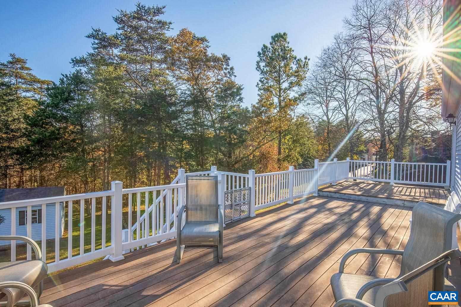 3248 Welsh Run Road Ruckersville, VA 22968 - Photo 35 of 43 a view of a balcony with wooden floor and fence