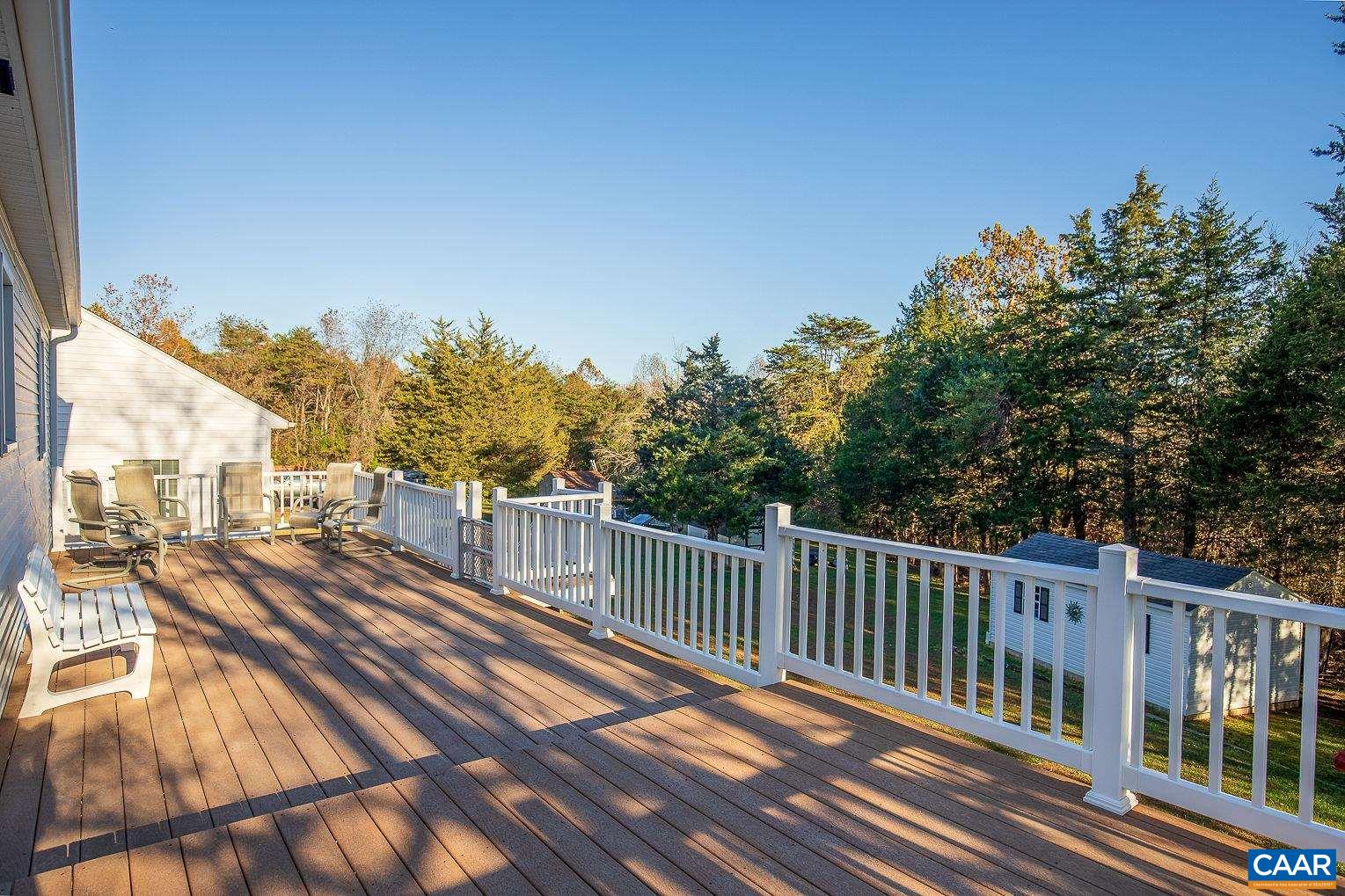 3248 Welsh Run Road Ruckersville, VA 22968 - Photo 36 of 43 a view of a balcony with wooden floor and fence