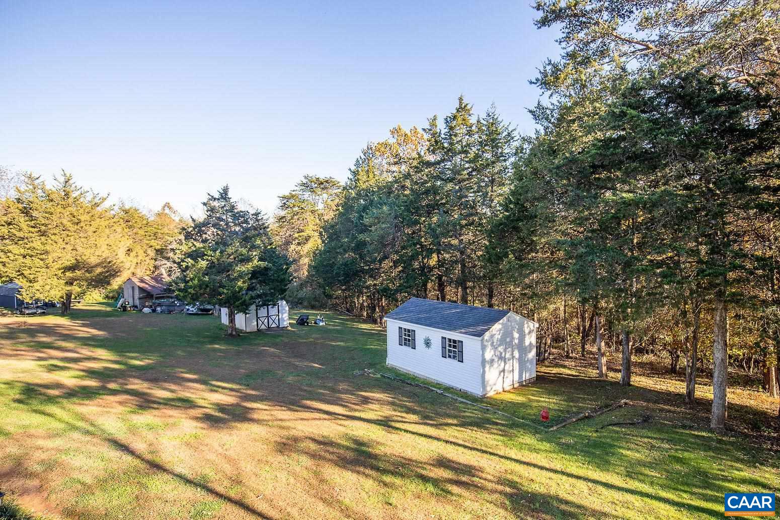 3248 Welsh Run Road Ruckersville, VA 22968 - Photo 39 of 43 a view of a house with a yard