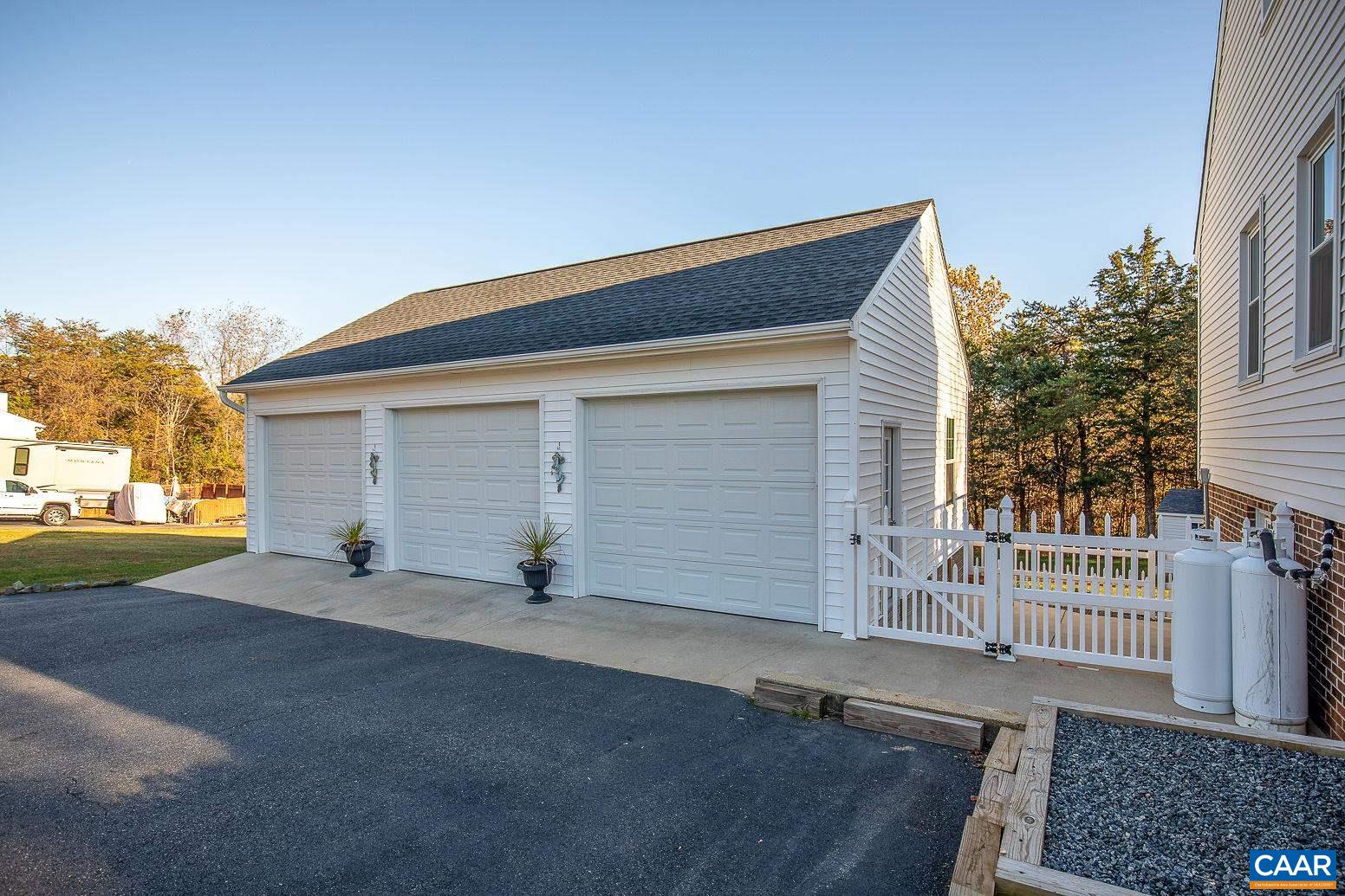 3248 Welsh Run Road Ruckersville, VA 22968 - Photo 41 of 43 front view of a house with a street