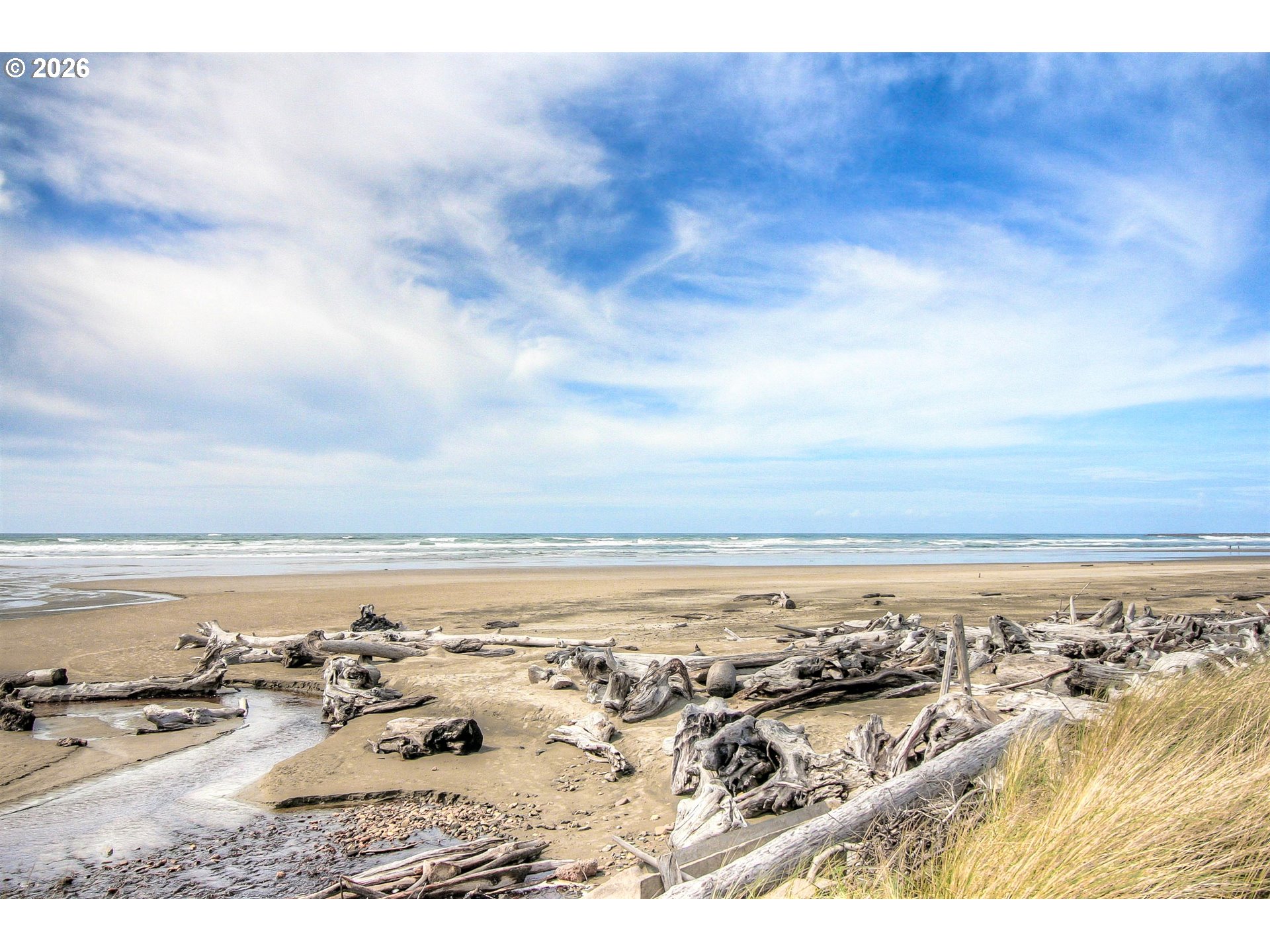 Southwest 61st Street, Unit 7300 South Beach, OR 97366 - Photo 24 of 26 a view of an ocean
