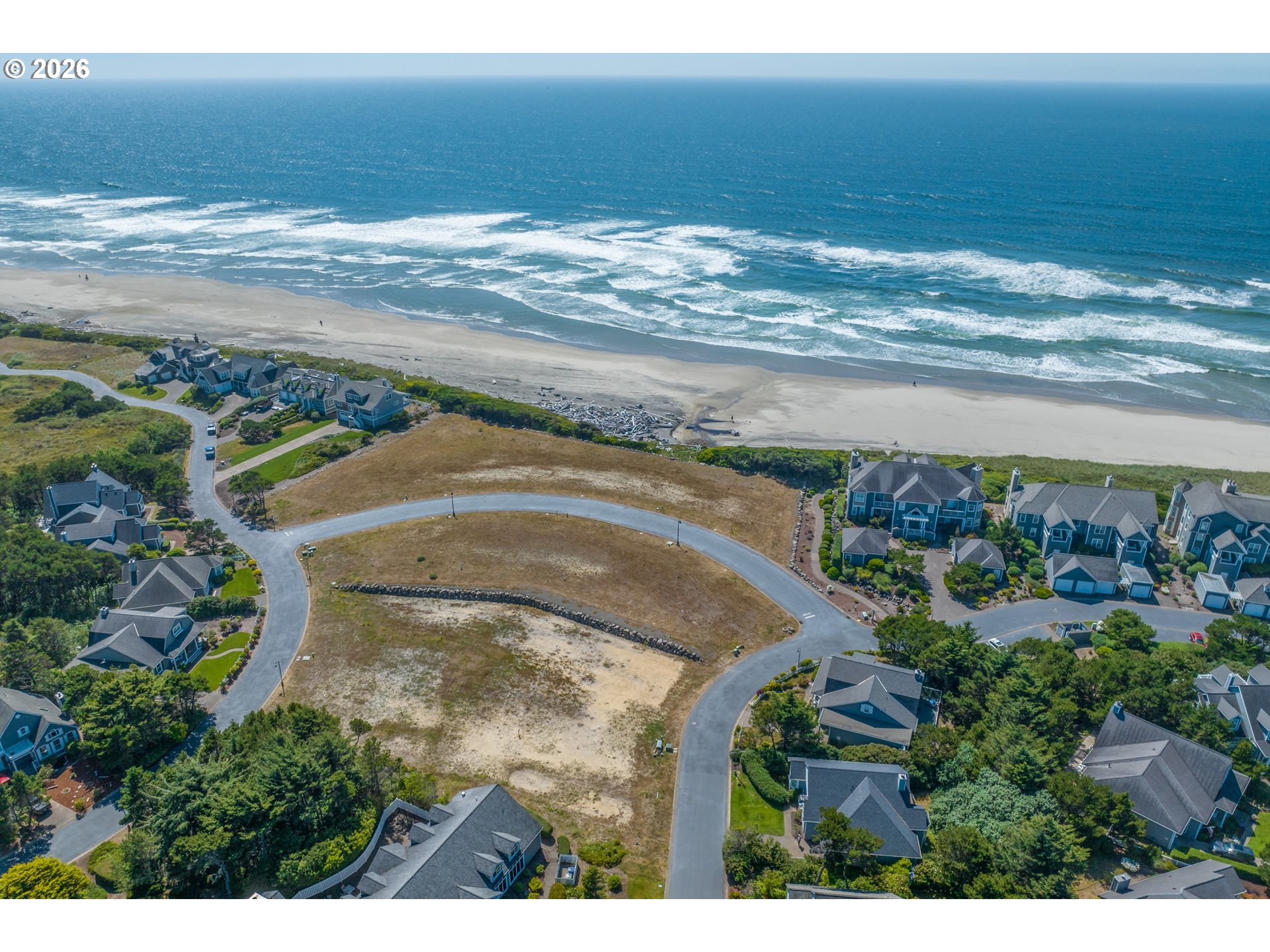 Southwest 61st Street, Unit 7300 South Beach, OR 97366 - Photo 4 of 26 a view of ocean view with beach