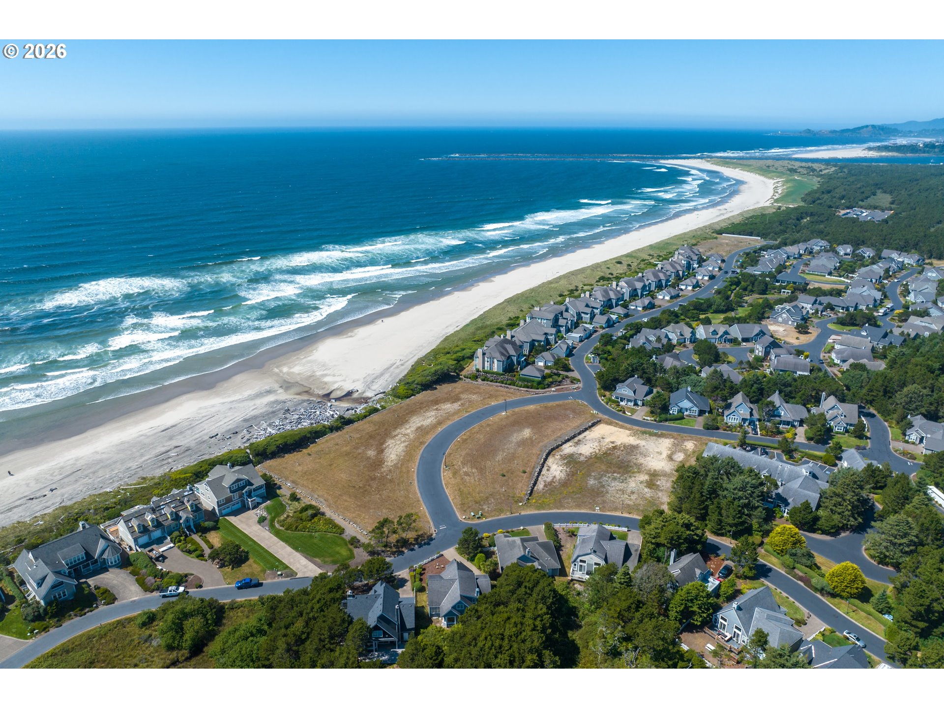 Southwest 61st Street, Unit 7300 South Beach, OR 97366 - Photo 6 of 26 a view of a yard
