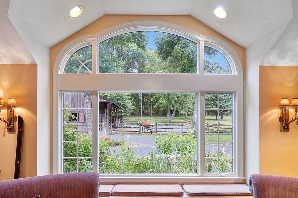 18 Wheeler Road Lincoln, MA 01773 - Photo 12 of 42 a view of a porch with furniture and garden