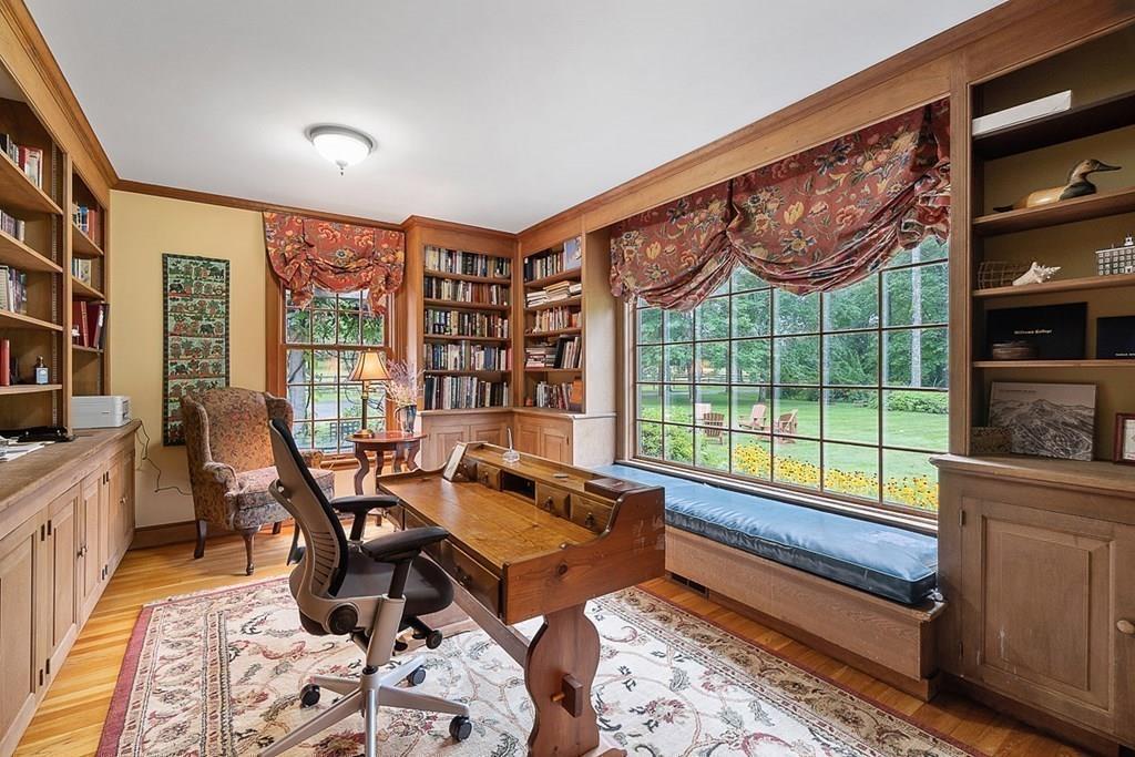 18 Wheeler Road Lincoln, MA 01773 - Photo 13 of 42 a living room with furniture and a floor to ceiling window