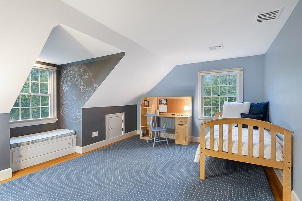 18 Wheeler Road Lincoln, MA 01773 - Photo 21 of 42 a bedroom with furniture and a window