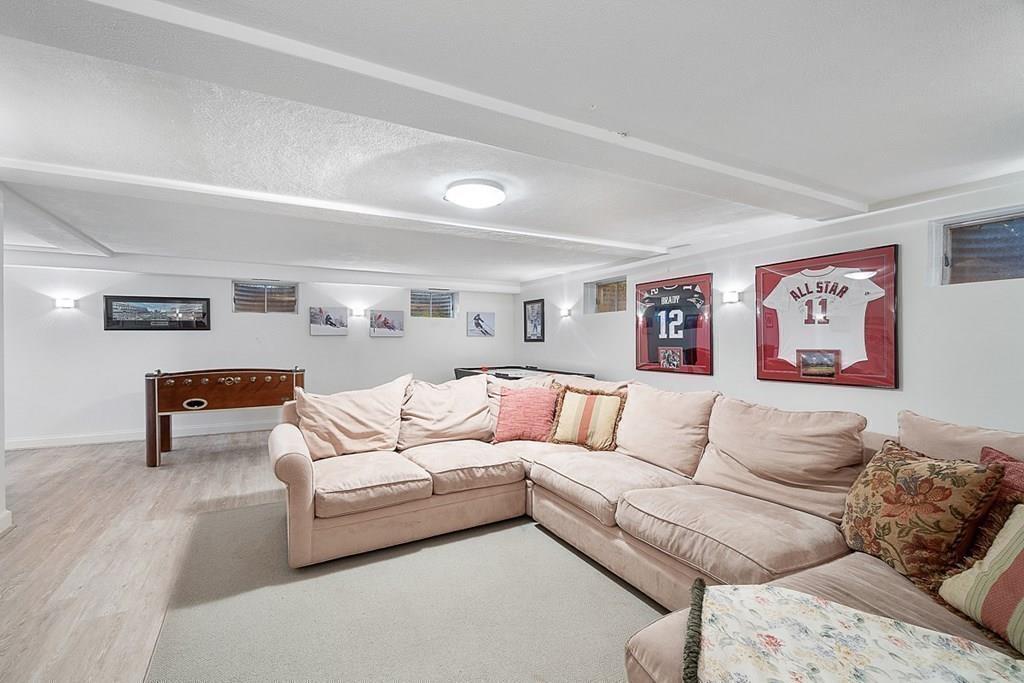 18 Wheeler Road Lincoln, MA 01773 - Photo 28 of 42 a living room with furniture and a couch
