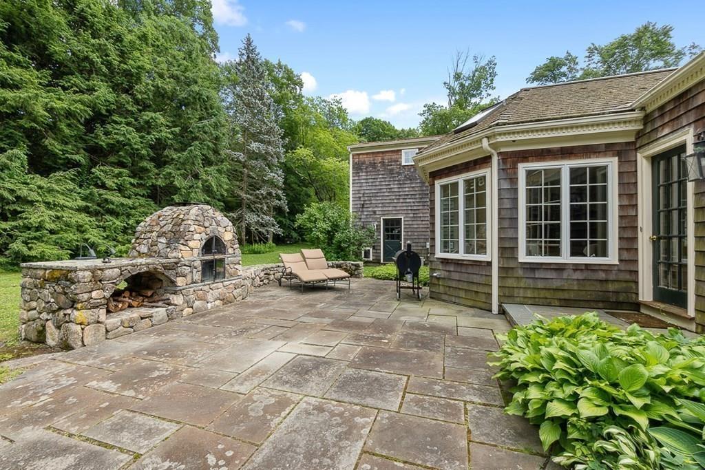 18 Wheeler Road Lincoln, MA 01773 - Photo 33 of 42 a view of house with backyard and sitting area