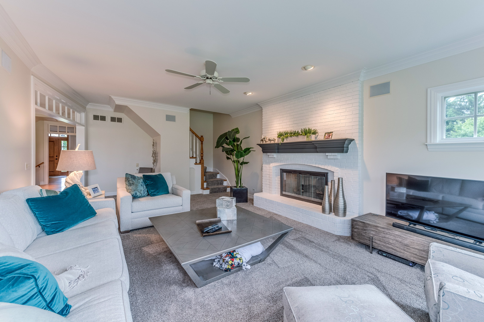 1009 Sutton Place St. Charles, IL 60174 - Photo 14 of 41 a living room with furniture and a fireplace