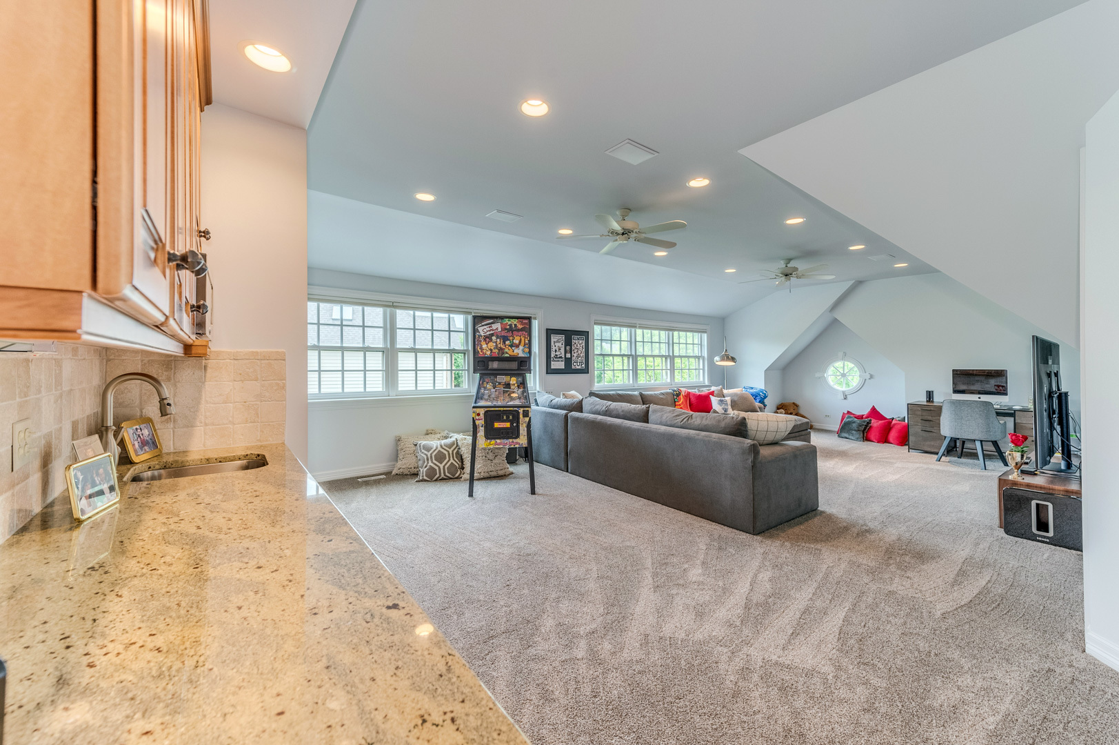 1009 Sutton Place St. Charles, IL 60174 - Photo 20 of 41 a living room with furniture and a flat screen tv