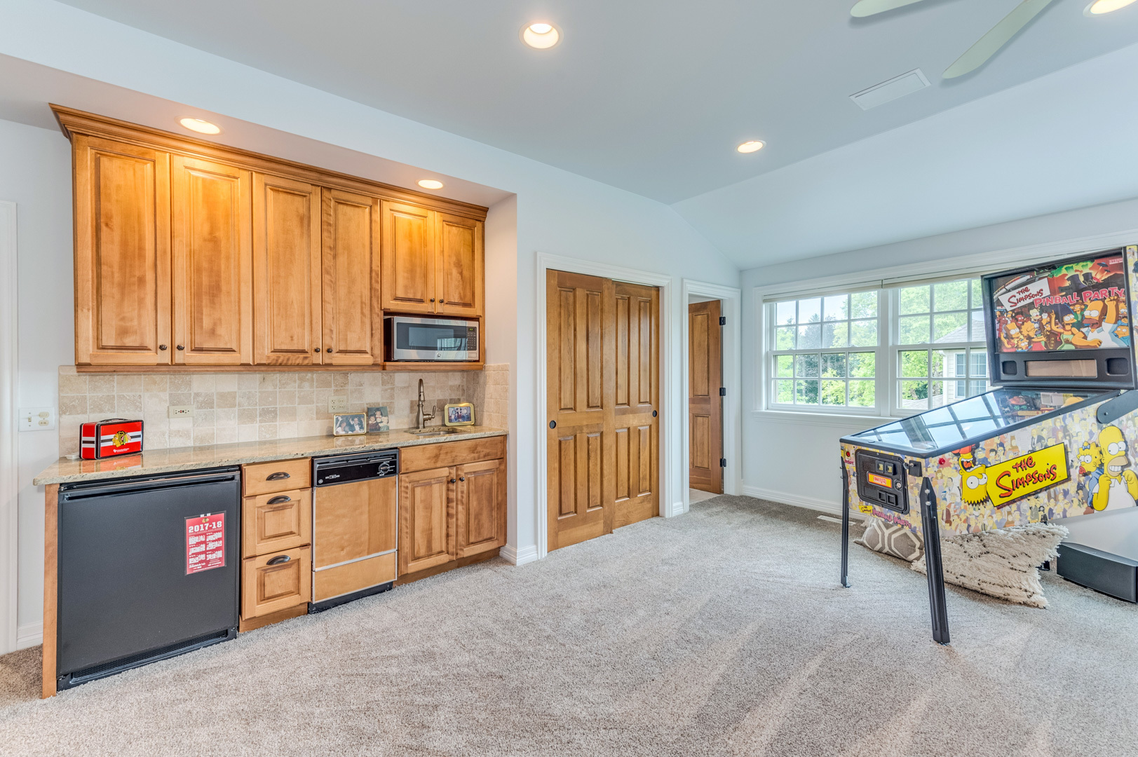 1009 Sutton Place St. Charles, IL 60174 - Photo 22 of 41 a kitchen with granite countertop a stove a sink and a refrigerator