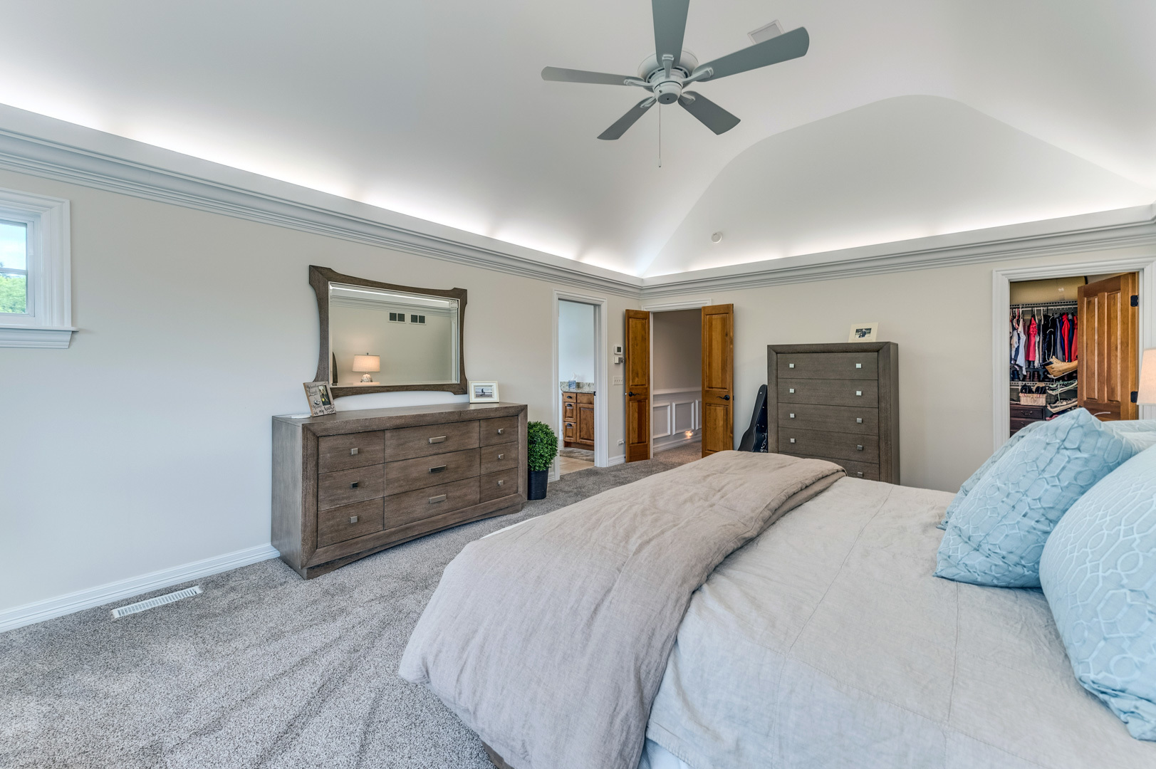 1009 Sutton Place St. Charles, IL 60174 - Photo 25 of 41 a bedroom with a bed and a dresser