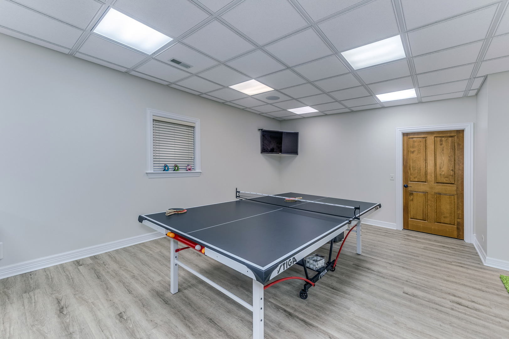 1009 Sutton Place St. Charles, IL 60174 - Photo 35 of 41 a room with pool table and a wooden floor