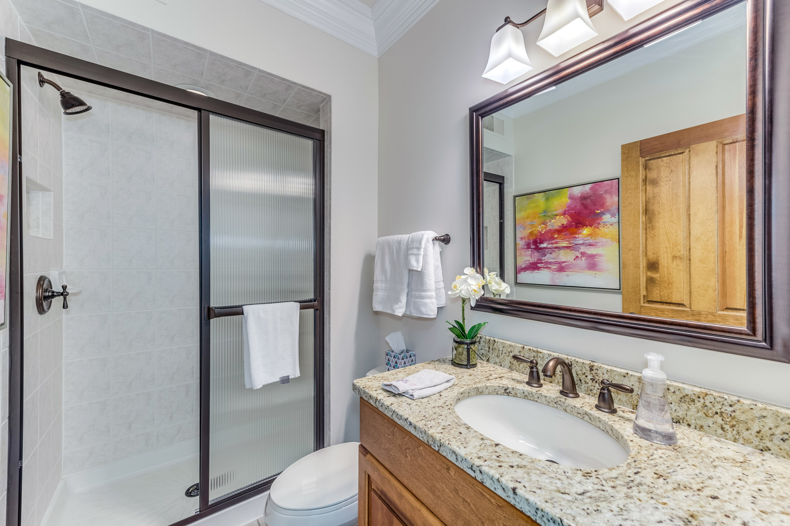 1009 Sutton Place St. Charles, IL 60174 - Photo 36 of 41 a bathroom with a granite countertop sink toilet and shower