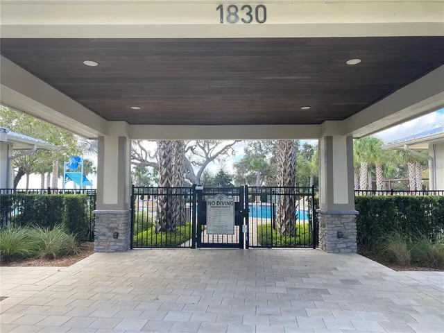 a view of backyard with green space