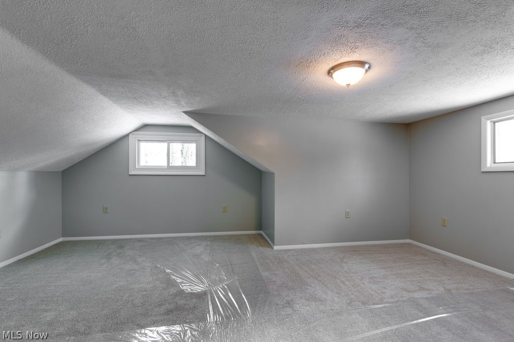 12529 Pearl Road Chardon, OH 44024 - Photo 18 of 33 one of the 6 bedrooms upstairs would make a GREAT upstairs family room - great architectural lines for this room and the entire home - such an exciting place and NOT a cookie cutter home