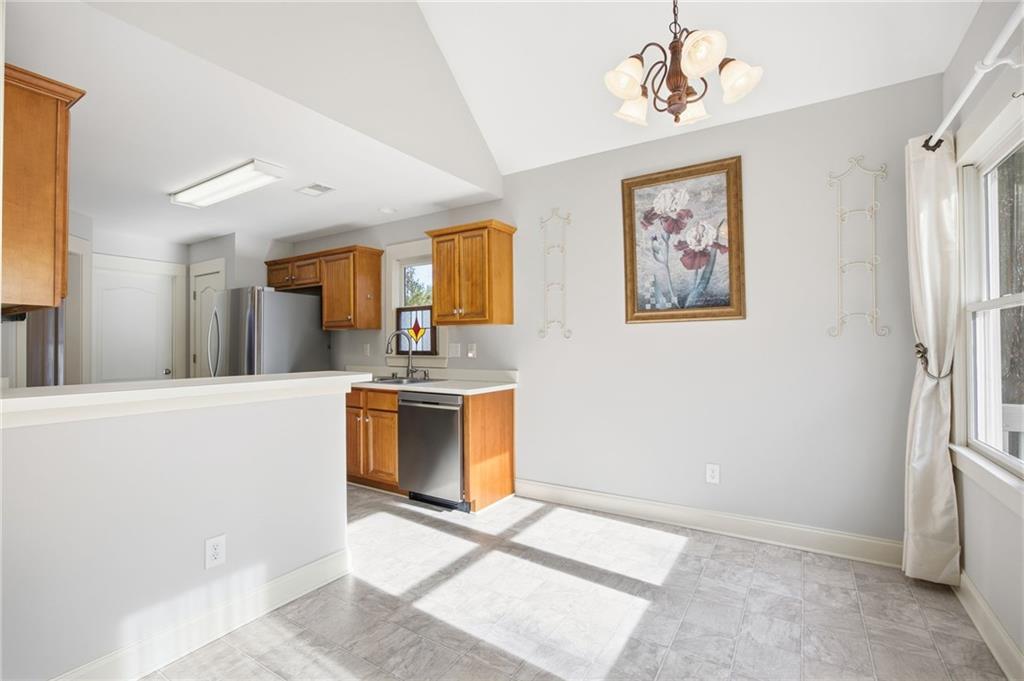 152 Jefferson Drive Dallas, GA 30132 - Photo 15 of 47 a view of a kitchen with a sink cabinets and a window