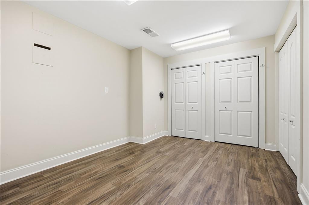 152 Jefferson Drive Dallas, GA 30132 - Photo 35 of 47 a view of an empty room with wooden floor