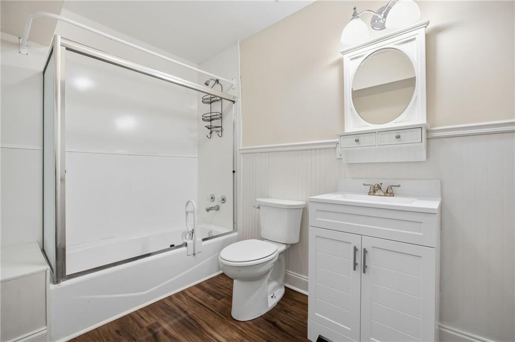 152 Jefferson Drive Dallas, GA 30132 - Photo 36 of 47 a bathroom with a sink a toilet and a mirror