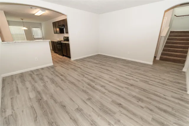 a view of a kitchen from the hallway