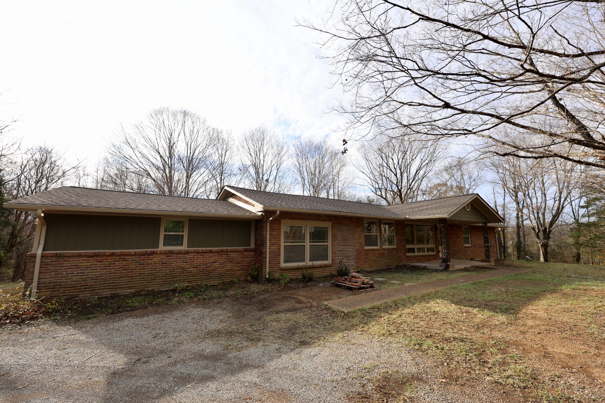 4392 Ashland City Road Clarksville, TN 37043 - Photo 4 of 19 a front view of a house with a yard