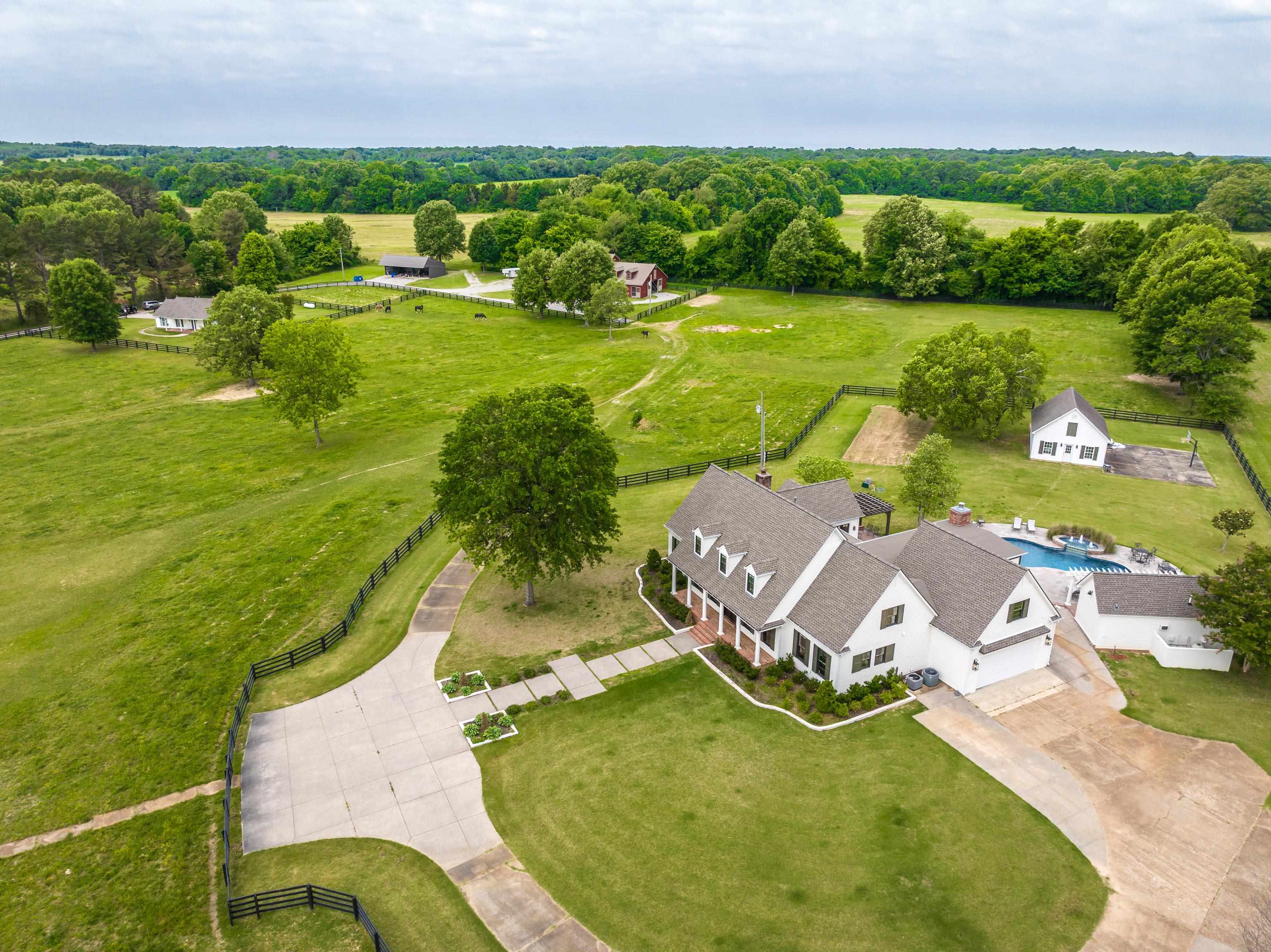 6085 Yum Yum Road Somerville, TN 38068 - Photo 5 of 40 an aerial view of a house with a garden