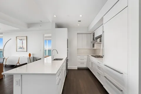 a bedroom with furniture and a closet