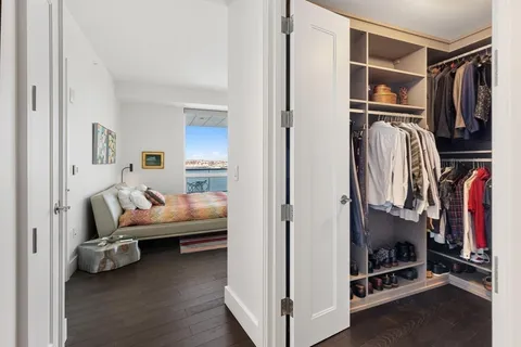 a room with a bed and a window