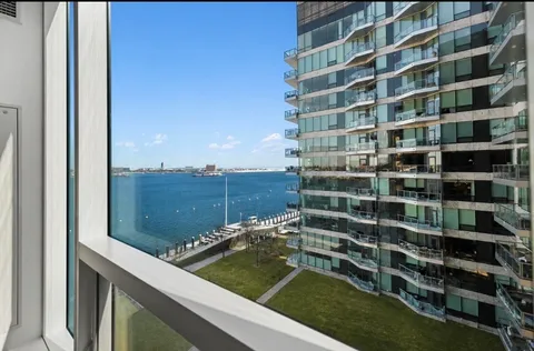 a view of balcony and deck with seating area