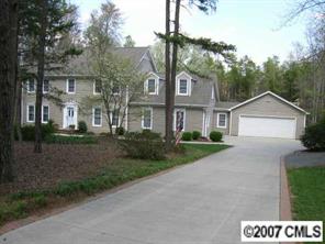3227 Gray Moss Road Charlotte, NC 28270 - Photo 1 of 8 a front view of a house with garden
