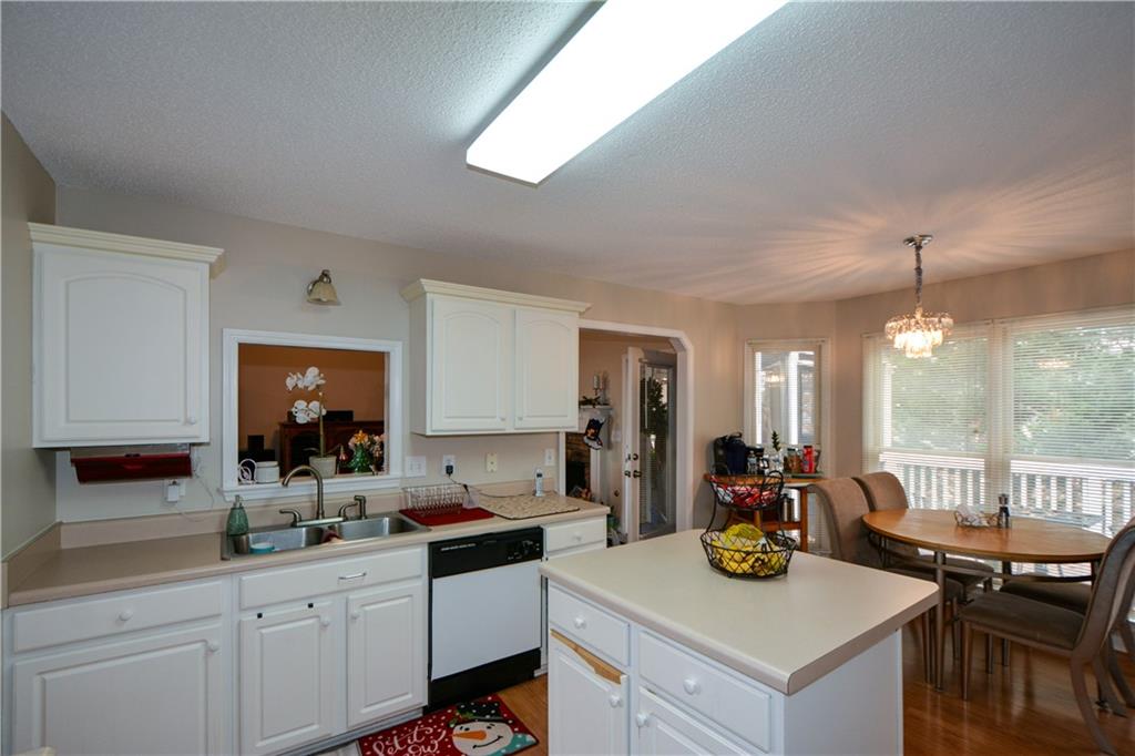 36 Austin Trail Douglasville, GA 30134 - Photo 13 of 43 a kitchen with sink stove and cabinets