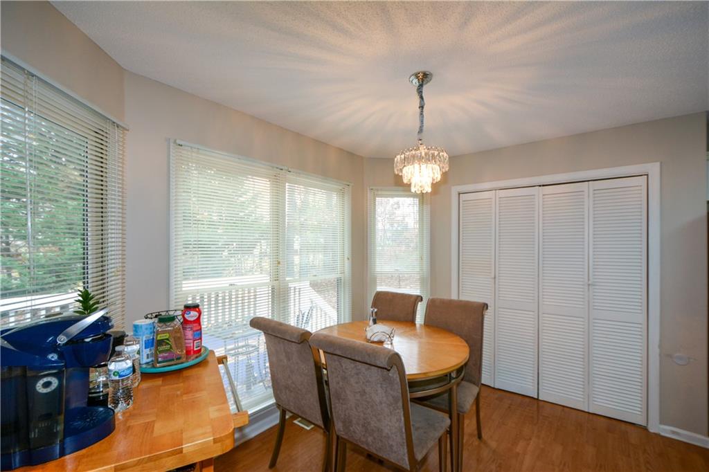 36 Austin Trail Douglasville, GA 30134 - Photo 15 of 43 a workspace with furniture large windows and wooden floor