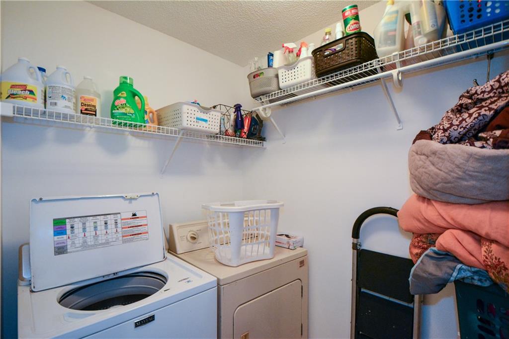36 Austin Trail Douglasville, GA 30134 - Photo 16 of 43 a utility room with sink dryer and washer