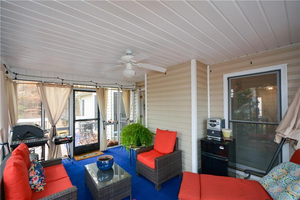 36 Austin Trail Douglasville, GA 30134 - Photo 18 of 43 a living room with furniture and a floor to ceiling window