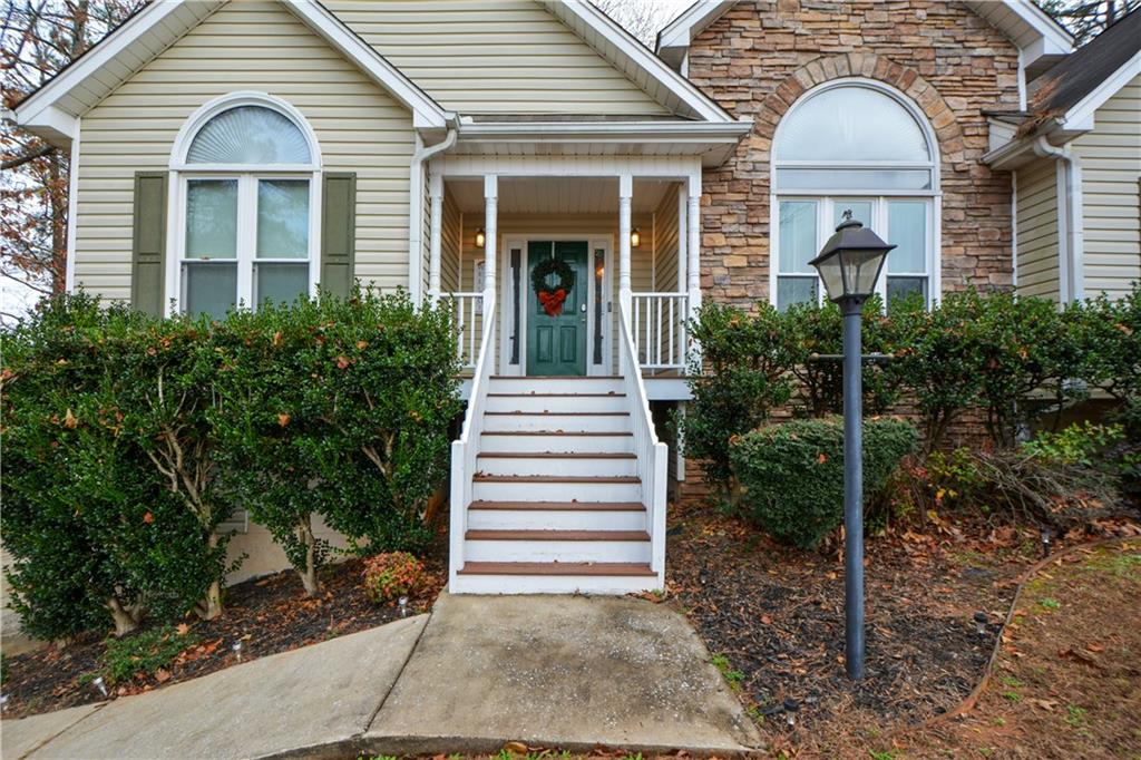 36 Austin Trail Douglasville, GA 30134 - Photo 2 of 43 a front view of a house with a garden