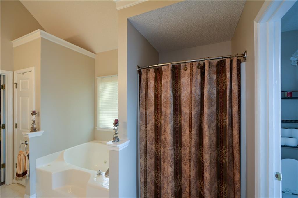 36 Austin Trail Douglasville, GA 30134 - Photo 24 of 43 a bathroom with shower and bathtub