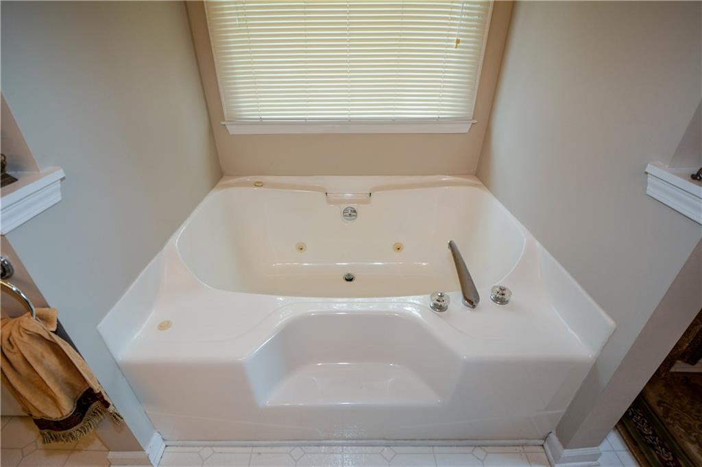 36 Austin Trail Douglasville, GA 30134 - Photo 25 of 43 a white bath tub sitting in a bathroom