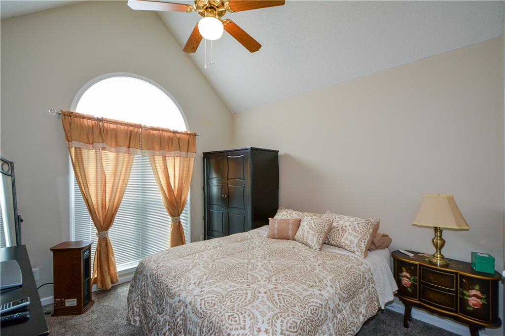 36 Austin Trail Douglasville, GA 30134 - Photo 26 of 43 a bedroom with a bed and a mirror