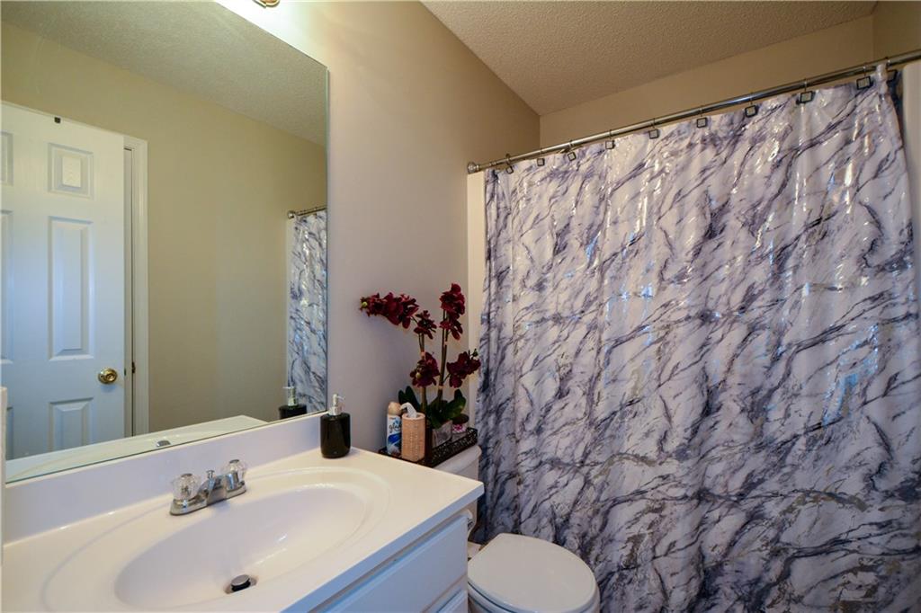 36 Austin Trail Douglasville, GA 30134 - Photo 30 of 43 a bathroom with a sink and a toilet