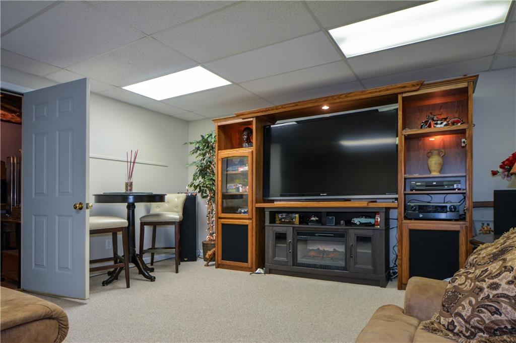36 Austin Trail Douglasville, GA 30134 - Photo 33 of 43 a living room with furniture and a flat screen tv