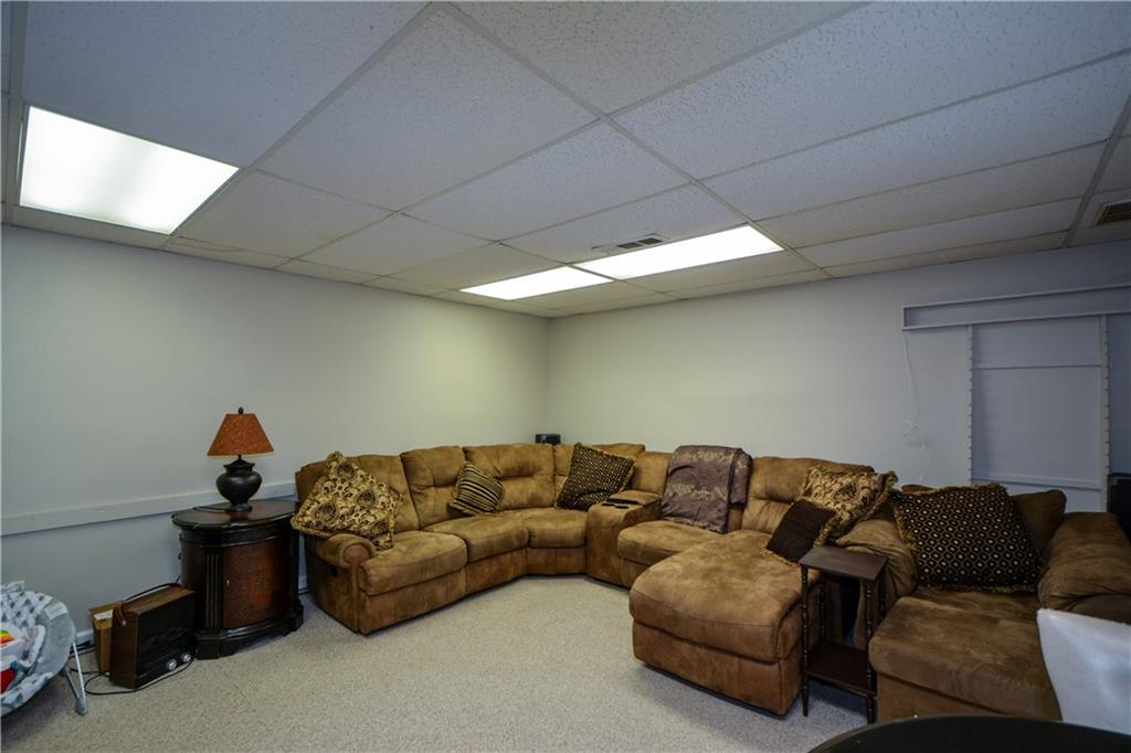 36 Austin Trail Douglasville, GA 30134 - Photo 34 of 43 a living room with furniture a couch and a window