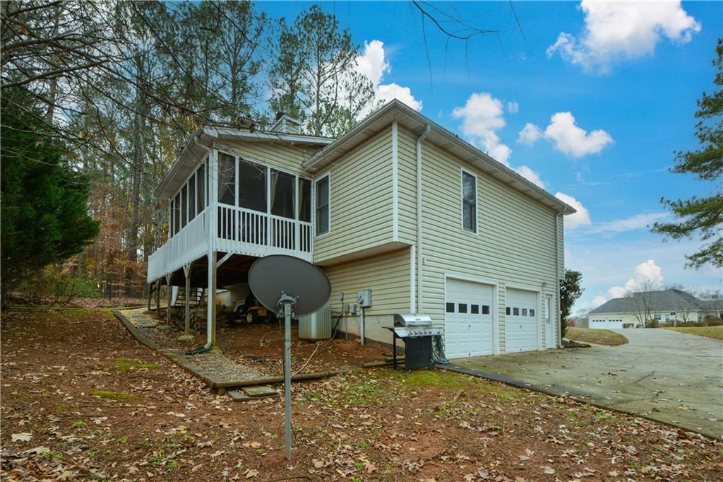 36 Austin Trail Douglasville, GA 30134 - Photo 38 of 43 a backyard of a house with table and chairs