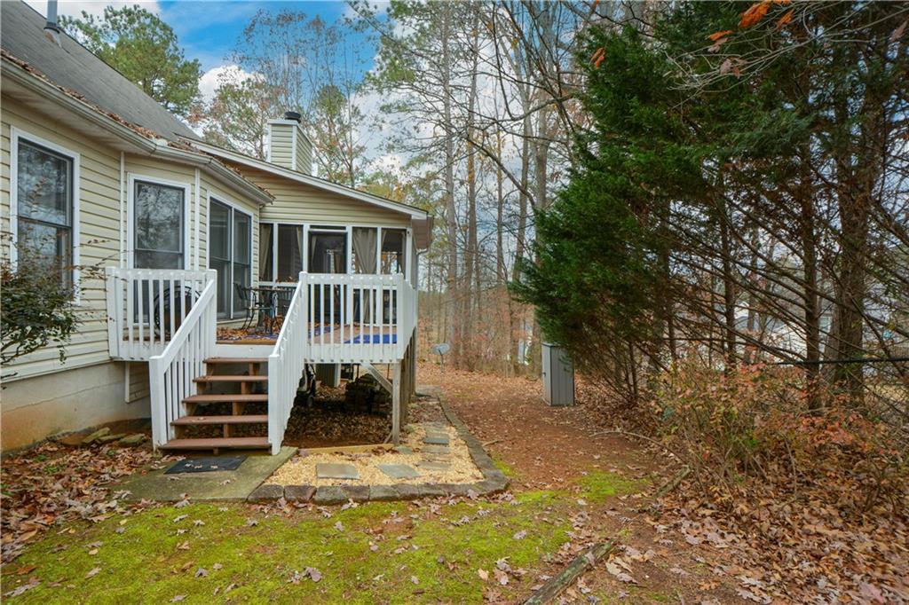 36 Austin Trail Douglasville, GA 30134 - Photo 40 of 43 a view of a chair and table in backyard of the house
