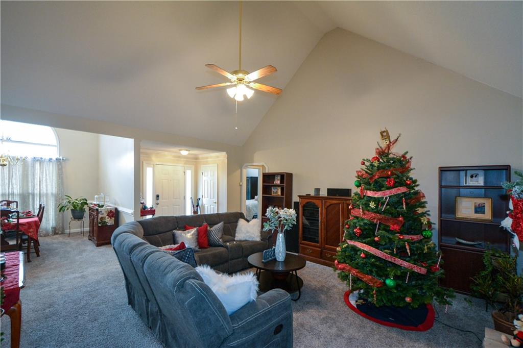 36 Austin Trail Douglasville, GA 30134 - Photo 7 of 43 a living room with furniture and a flat screen tv