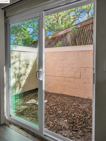a bathroom with a window and a shower